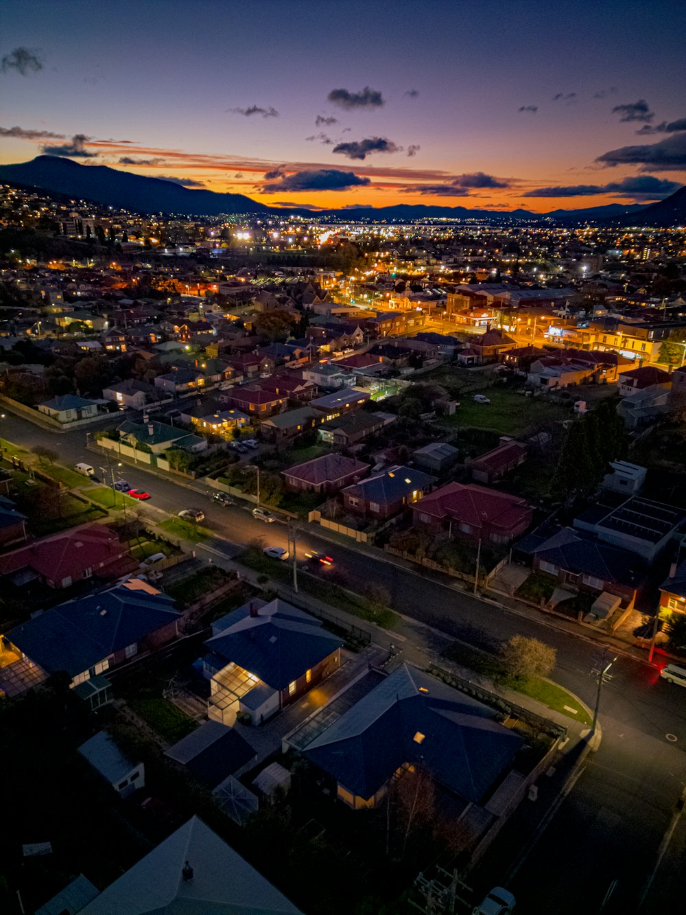 an aerial view of a city at night