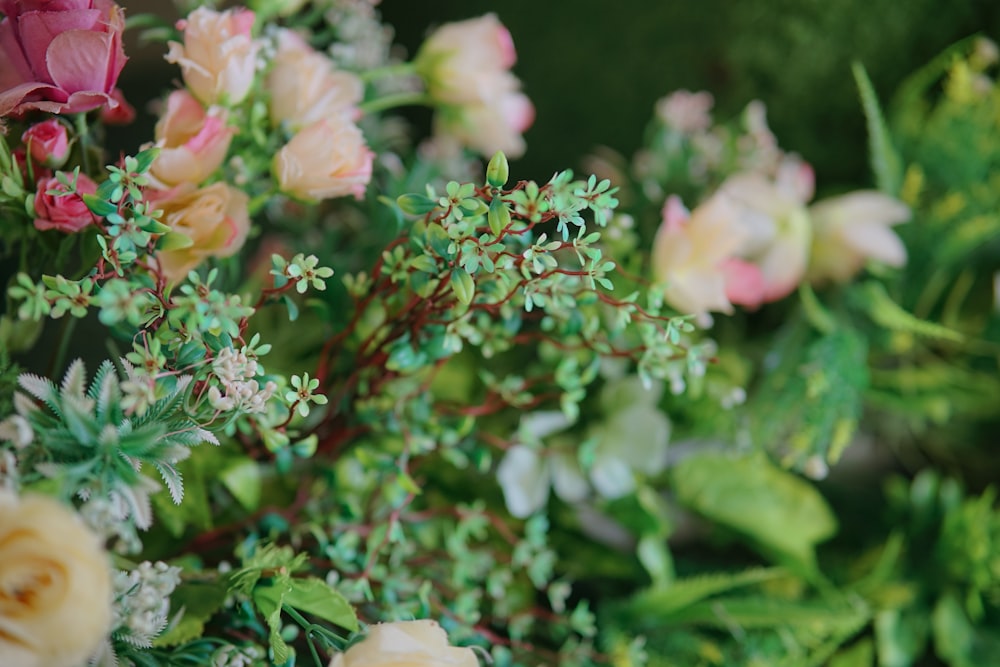 a bunch of flowers that are in a vase