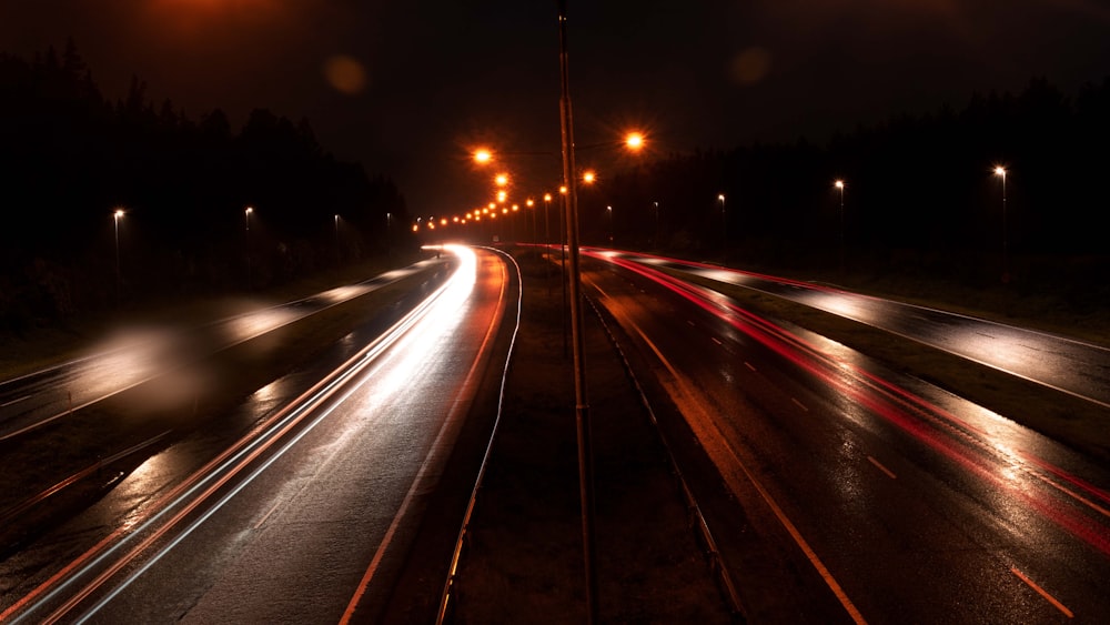 a night time picture of a city street