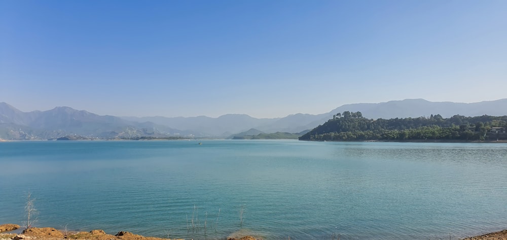 a large body of water surrounded by mountains