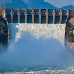 a large dam with water pouring out of it