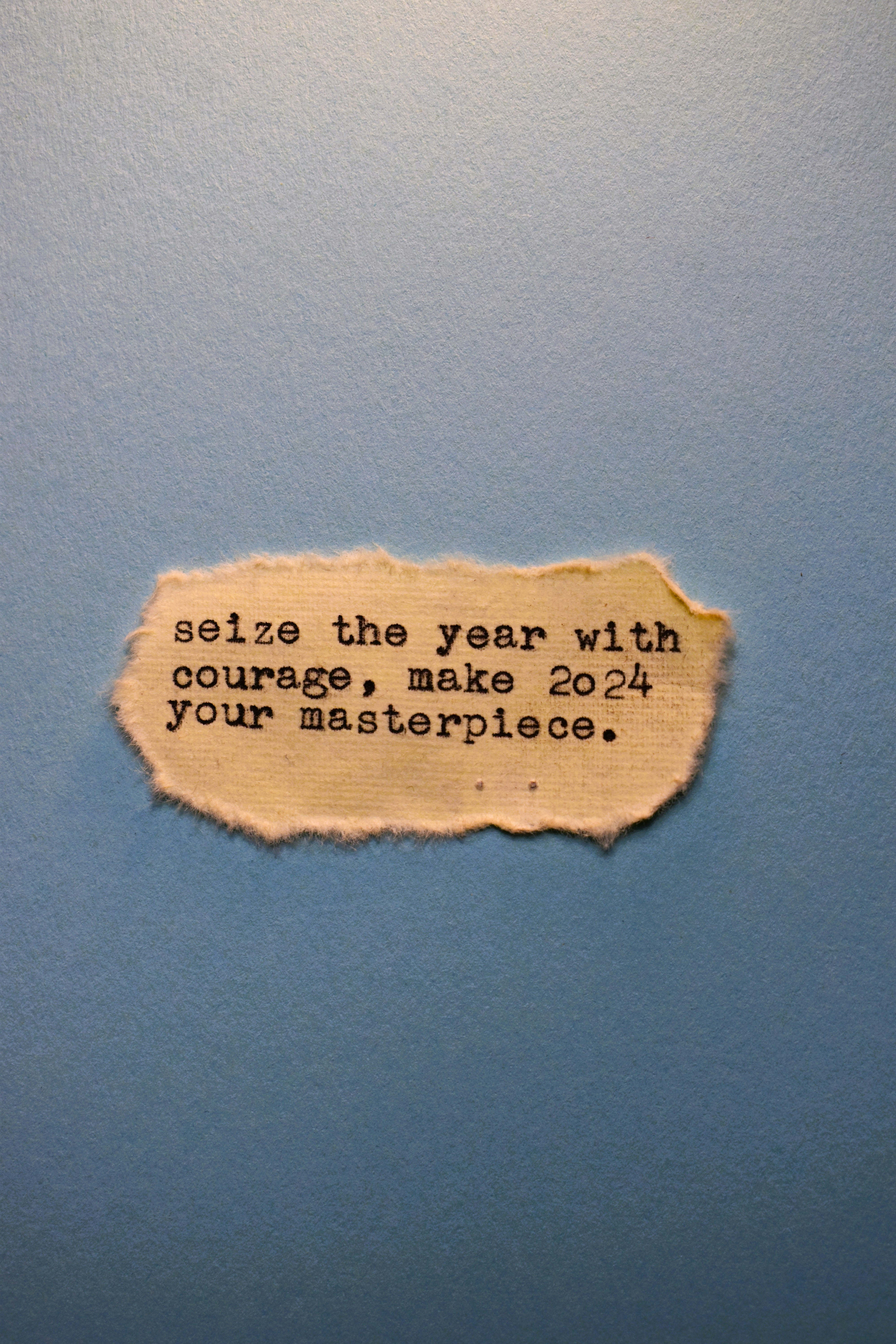 ein Blatt Papier mit einem Zitat darauf