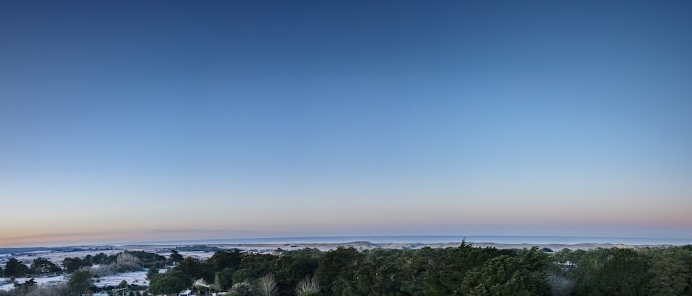 a view of a city from a hill top