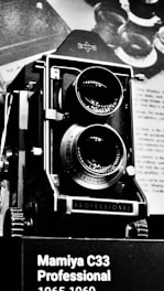 a black and white photo of a camera