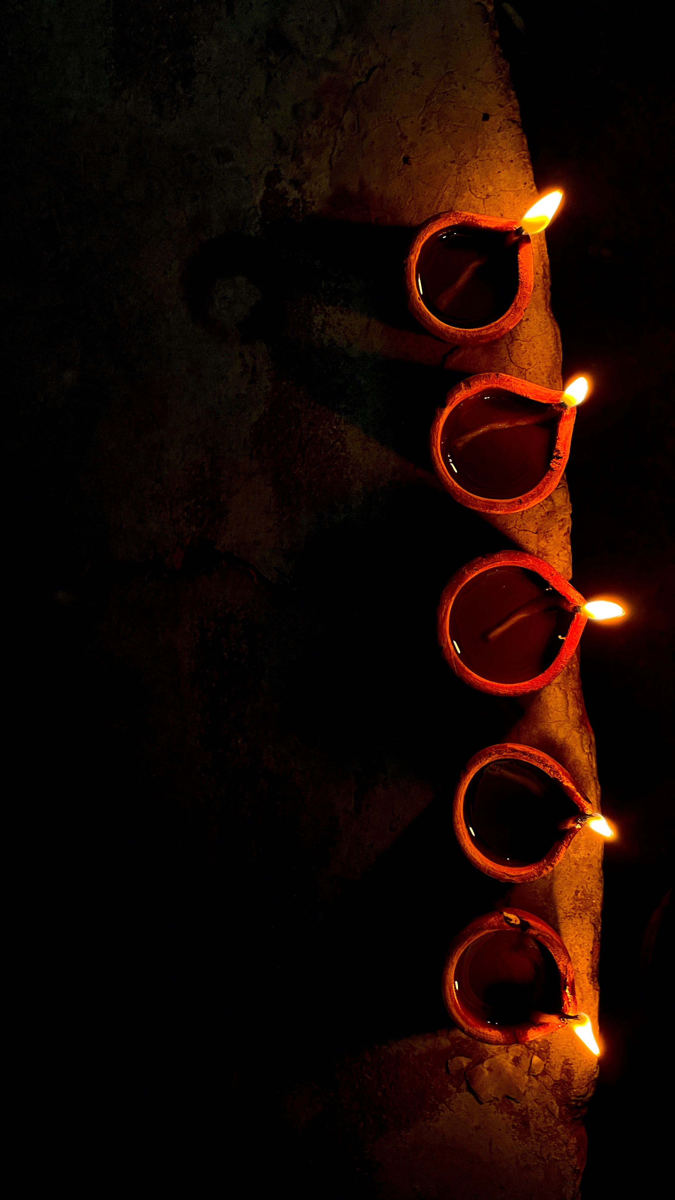 a row of glasses sitting on top of a table