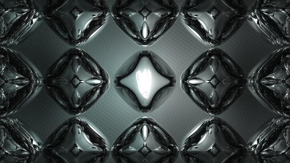 a shiny metal surface with a diamond pattern