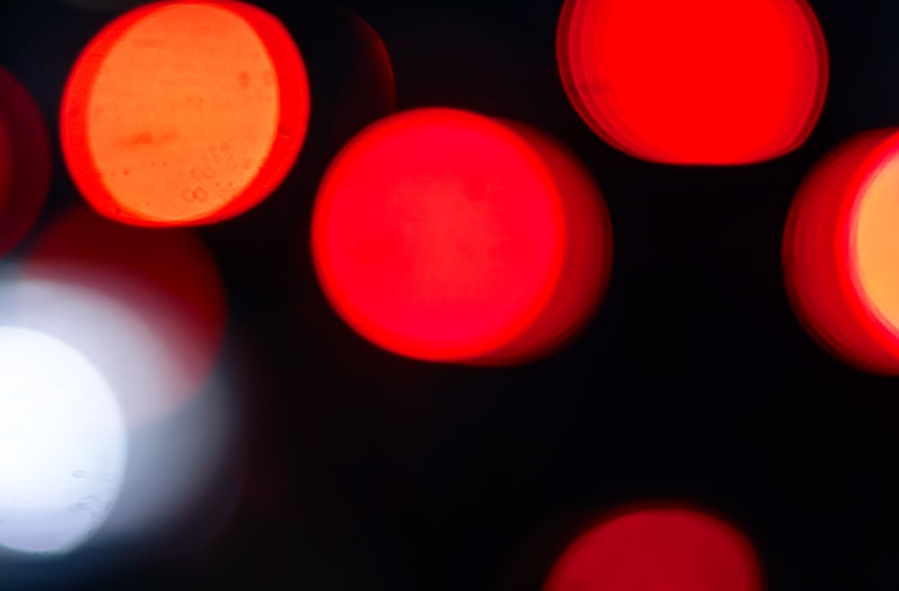 a close up of a red and yellow traffic light