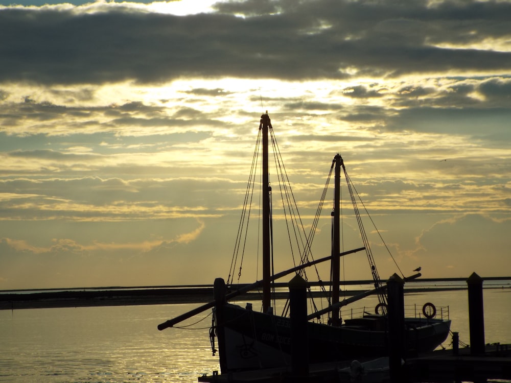 a boat sitting on top of a body of water