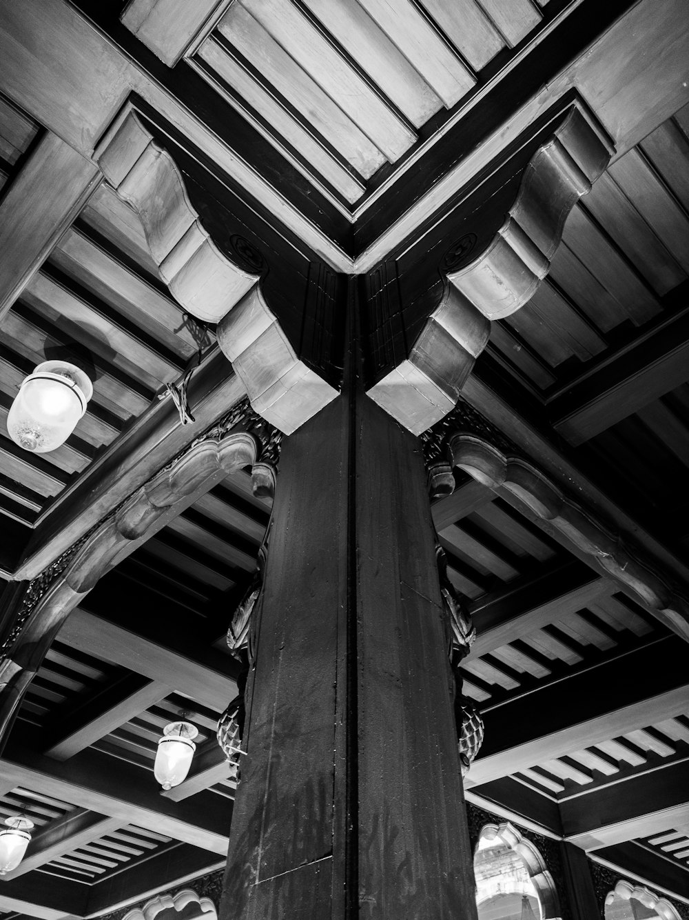 a black and white photo of a clock tower