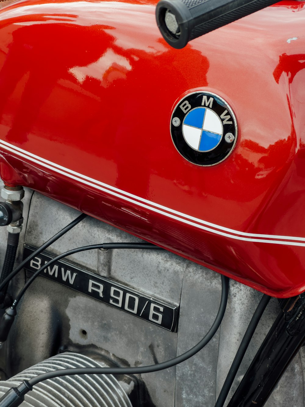 a close up of a red motorcycle engine