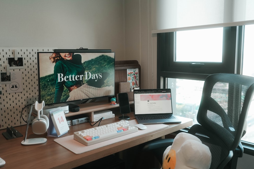 a desk with a computer, keyboard and mouse