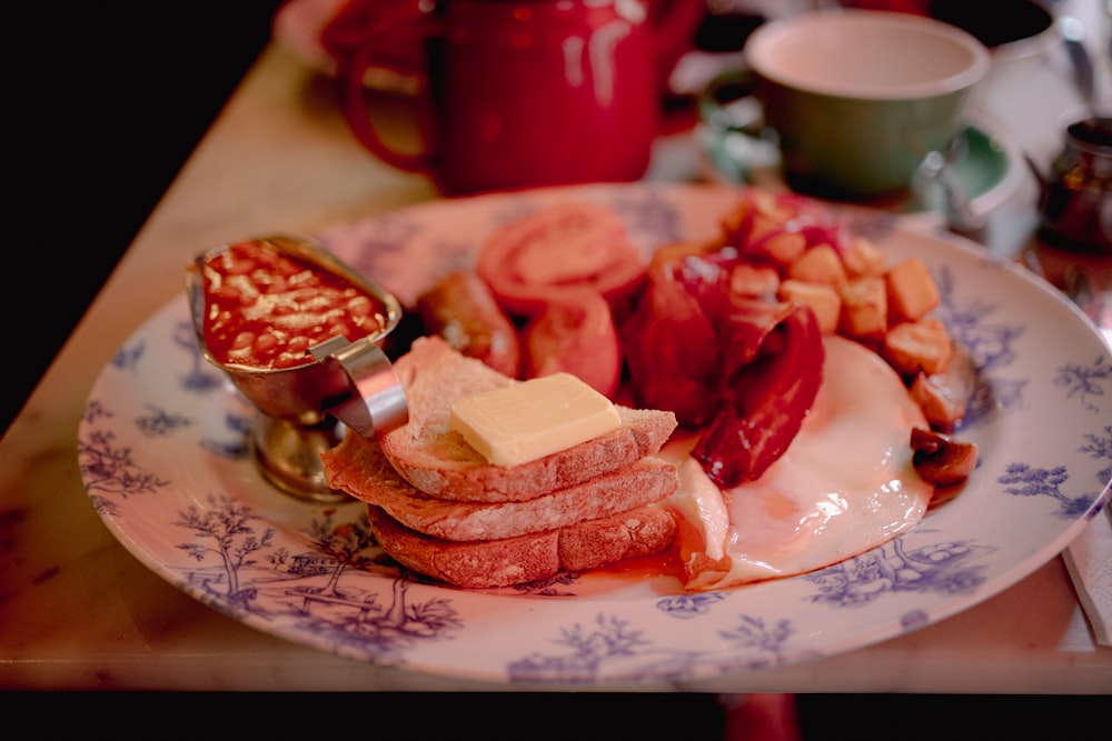 a plate of food on a table with a spoon