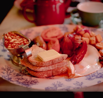 a plate of food on a table with a spoon