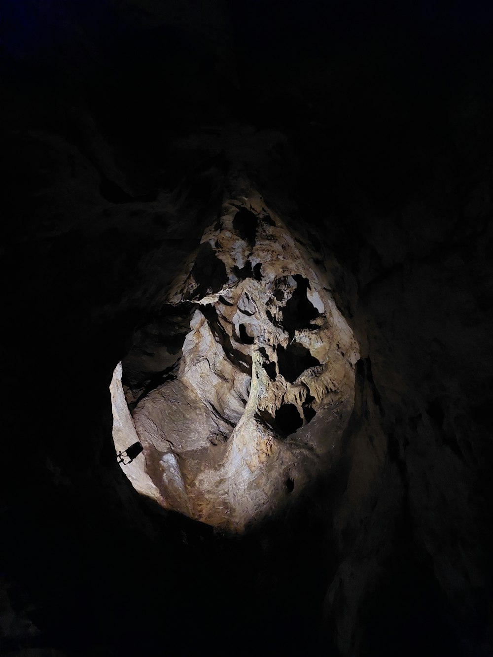 a rock formation in the middle of a cave