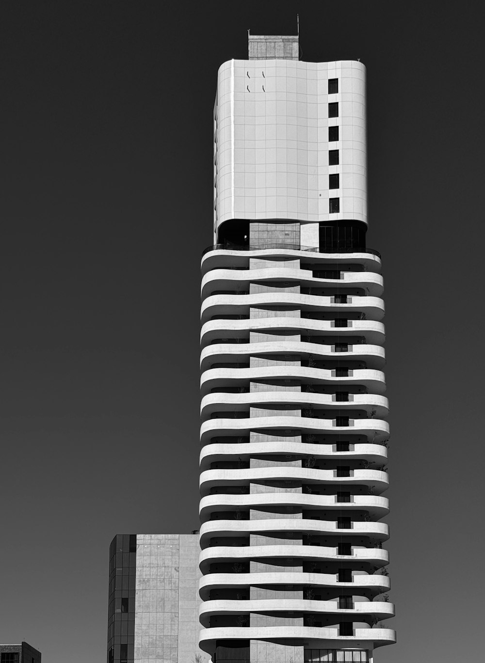 a black and white photo of a tall building