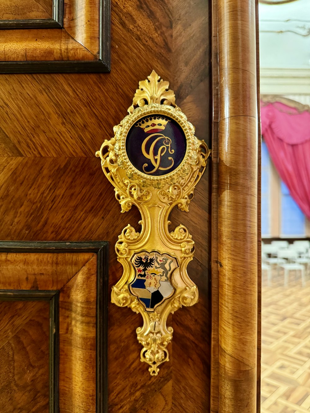 a clock on the side of a wooden door