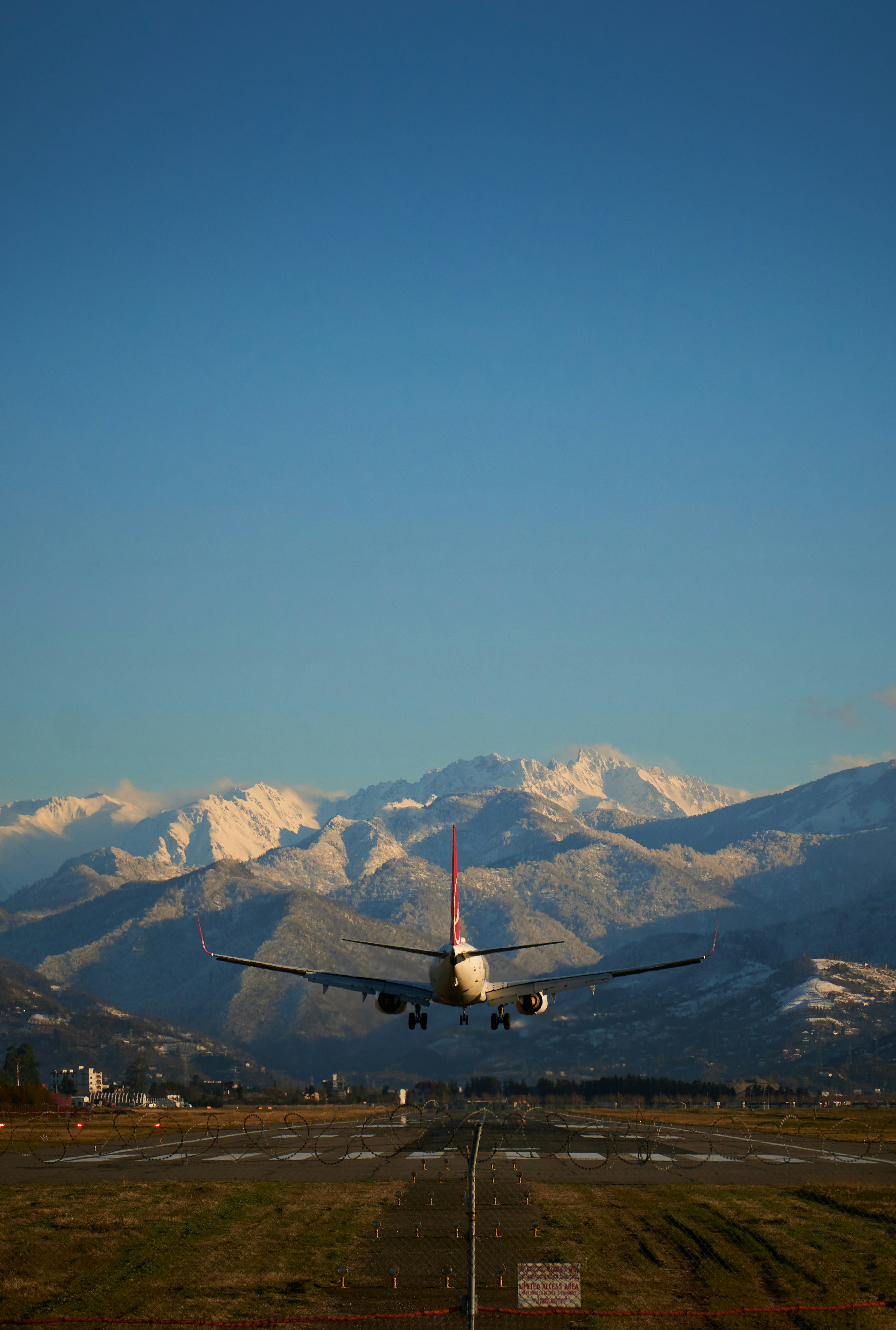 Airplane taking off from an airport runway