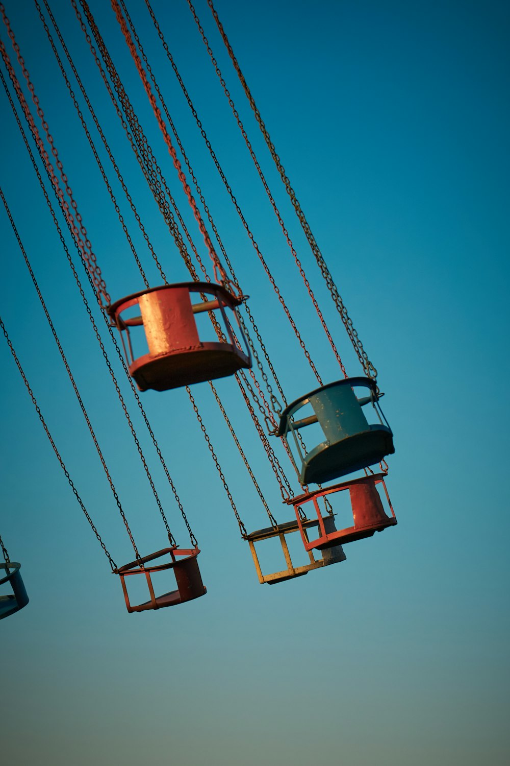 a group of metal objects suspended in the air