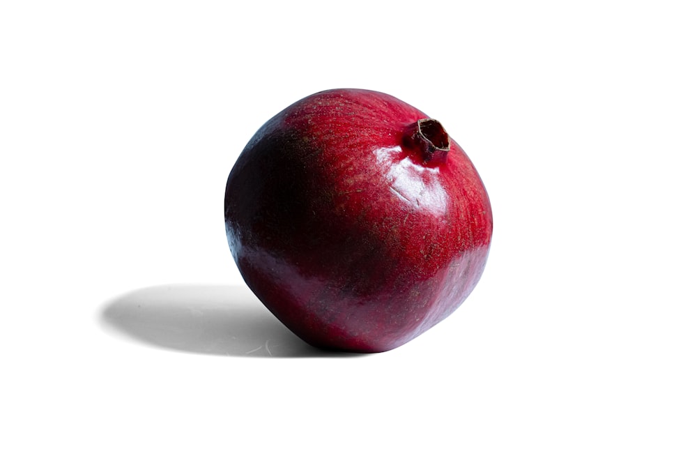 a close up of an apple on a white background