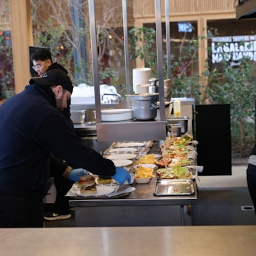 a man preparing food in a restaurant kitchen