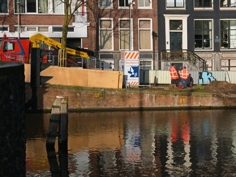 a construction site next to a body of water