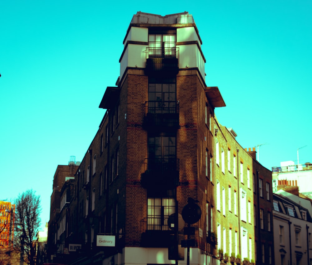 a tall building with a clock on the top of it