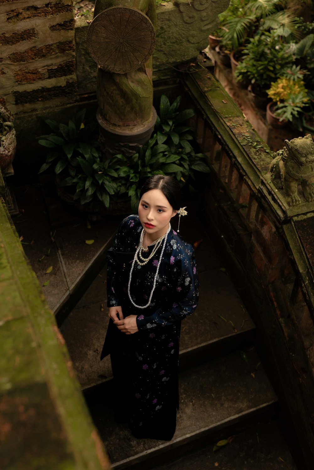 a woman standing on a set of stairs