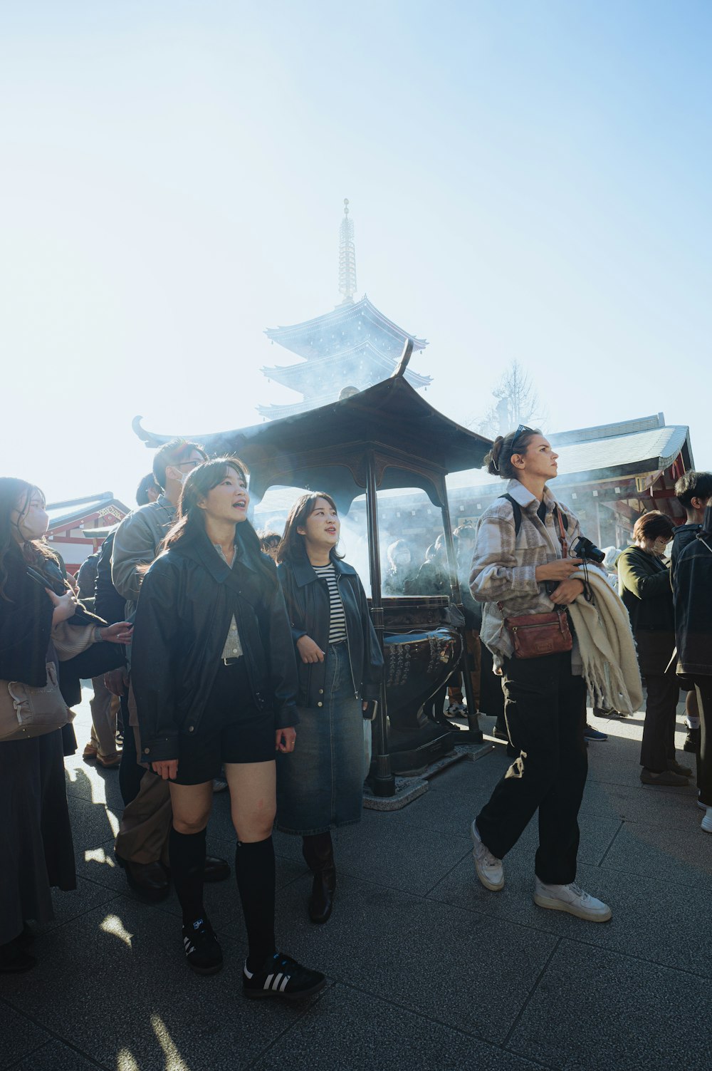 a group of people standing next to each other