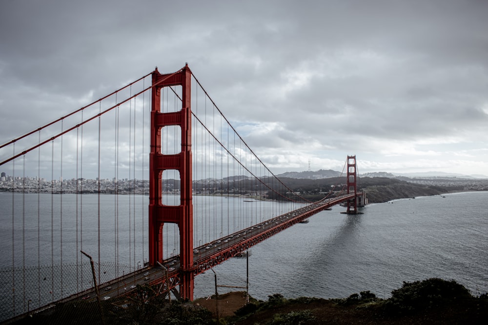 a view of the golden gate bridge from the top of a hill