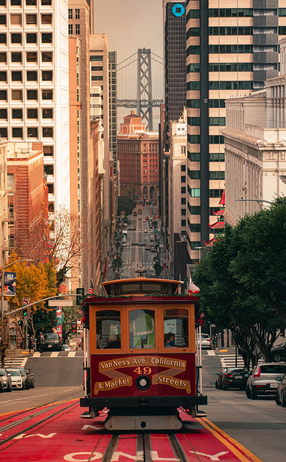 a trolley car traveling down a city street