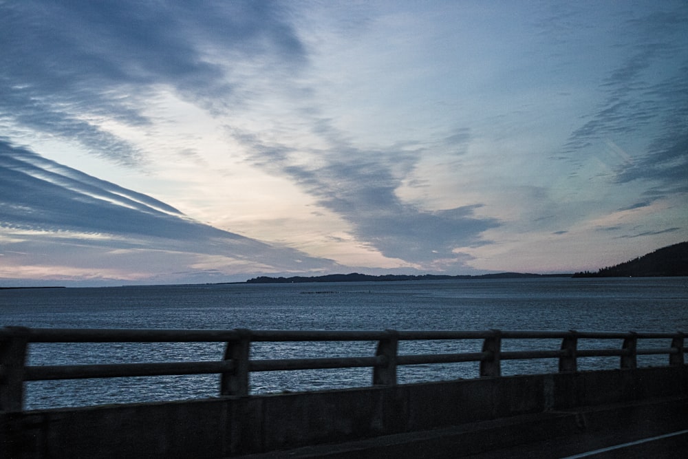 a view of a body of water from a bridge