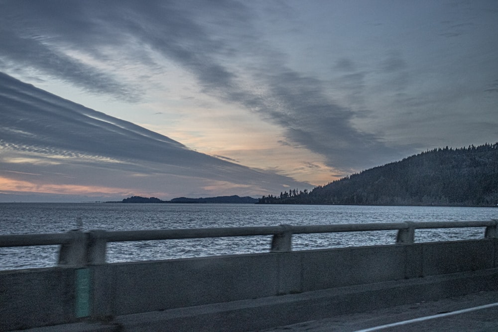 a view of a body of water from a bridge