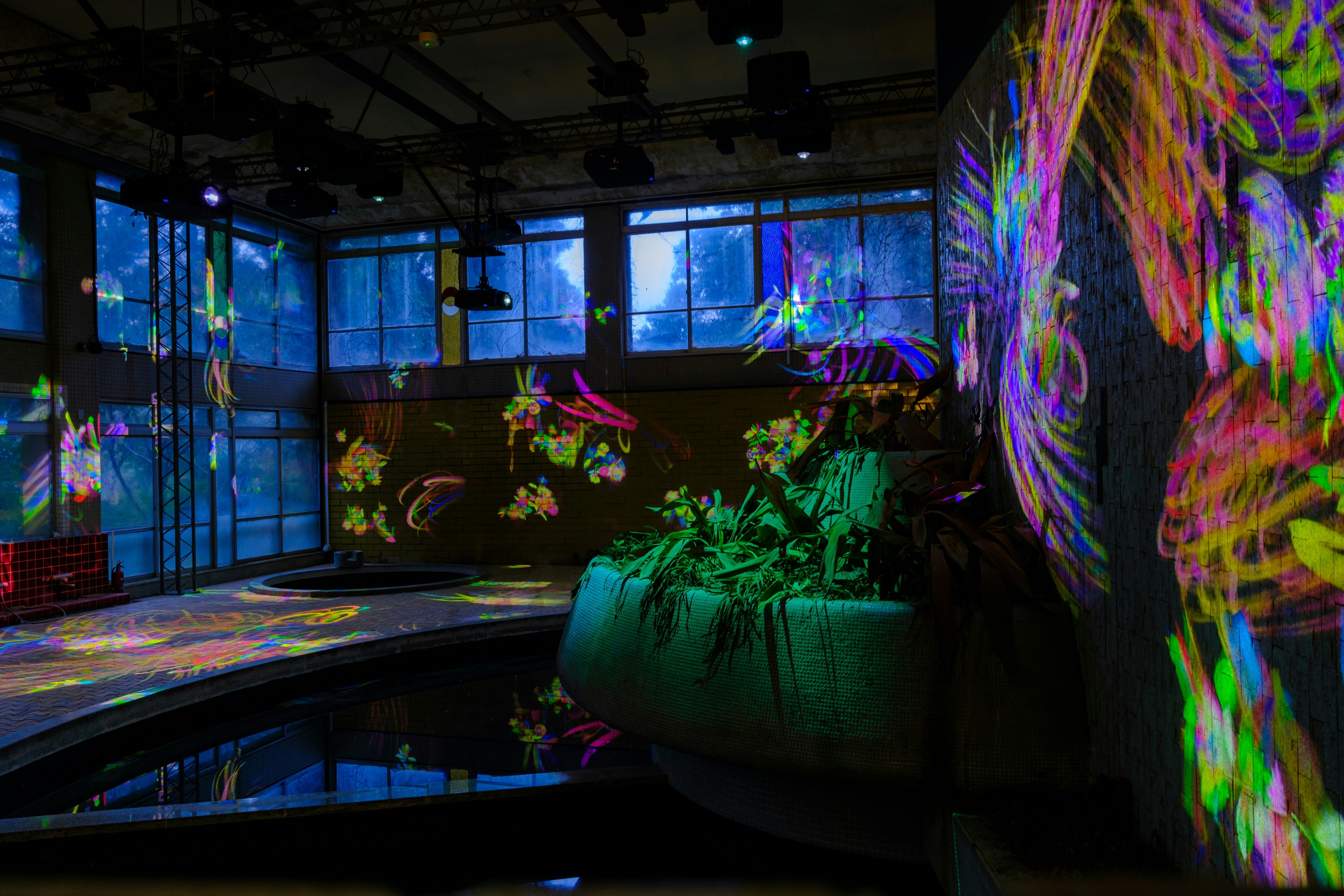 participatory themed environment with interactive lighting and spatial elements