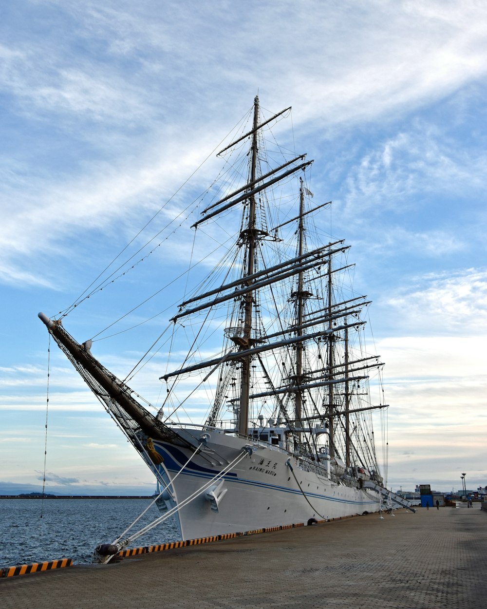 a large white boat sitting on top of a body of water