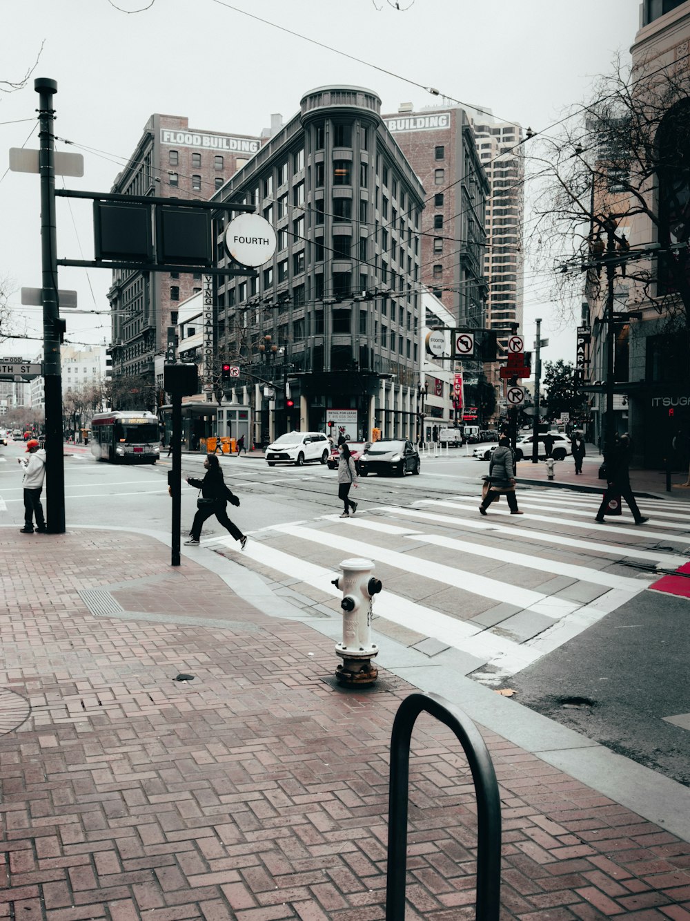 a city street filled with lots of tall buildings