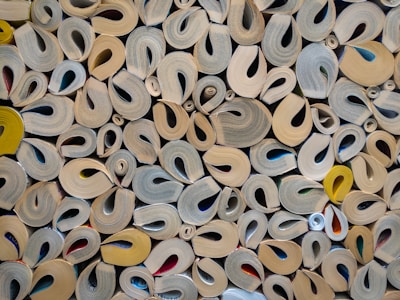 a pile of different types of scissors on a table