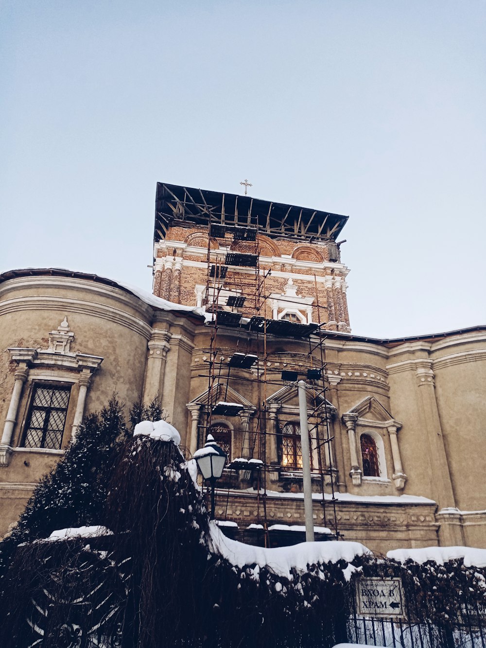 a church with a scaffolding system on top of it