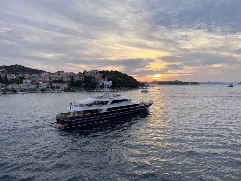 a large boat floating on top of a body of water