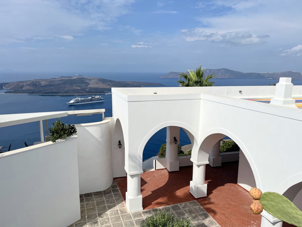 a balcony with a view of the ocean