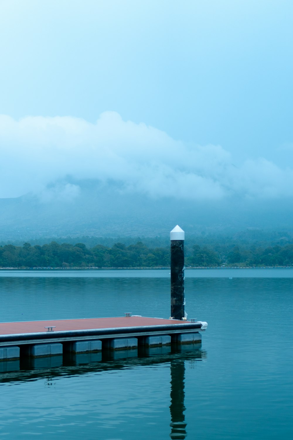 a dock in the middle of a body of water