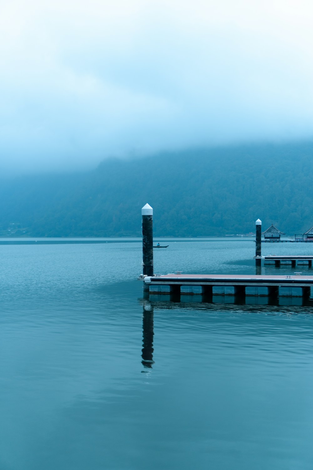 a dock in the middle of a body of water