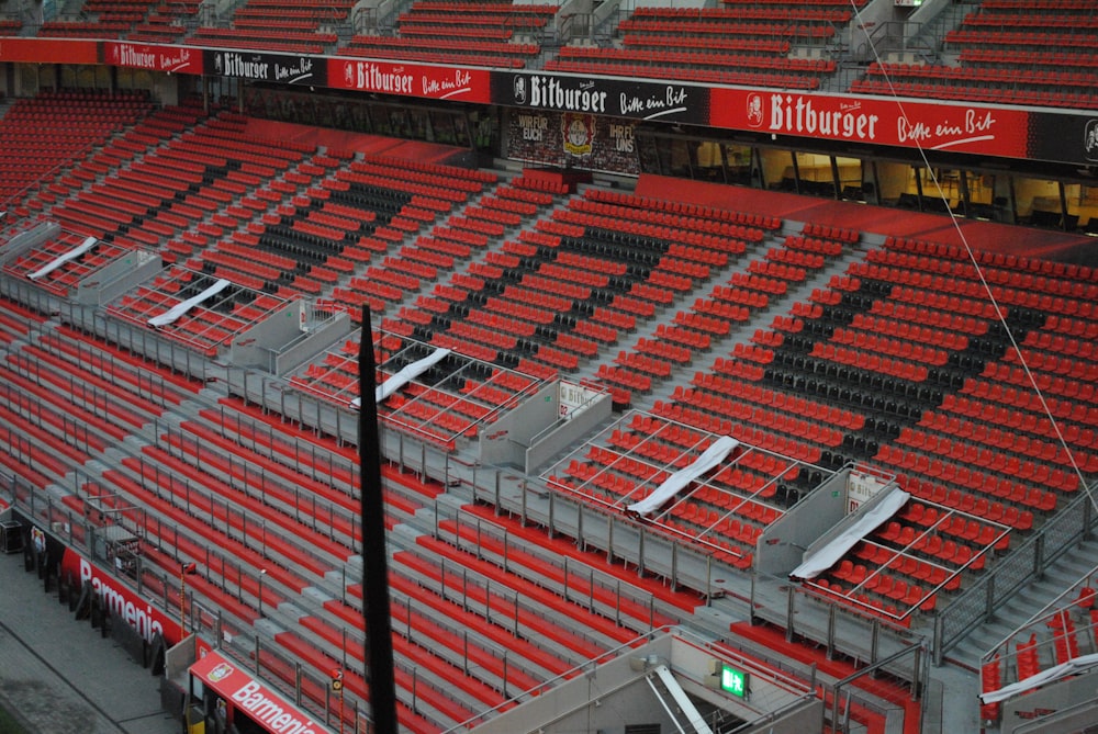 a stadium filled with lots of red seats