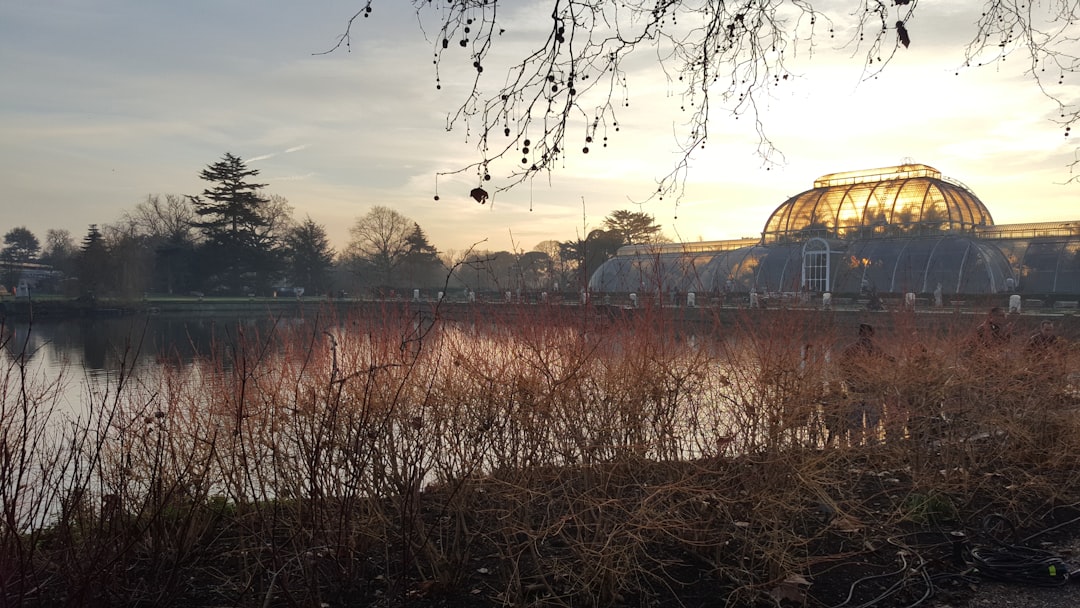 a large building sitting next to a body of water,