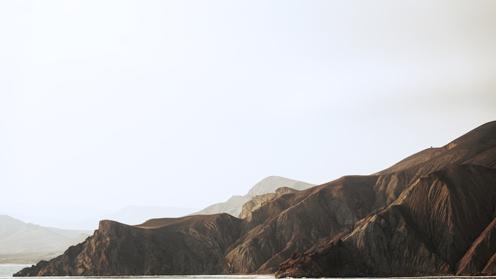 a large body of water surrounded by mountains