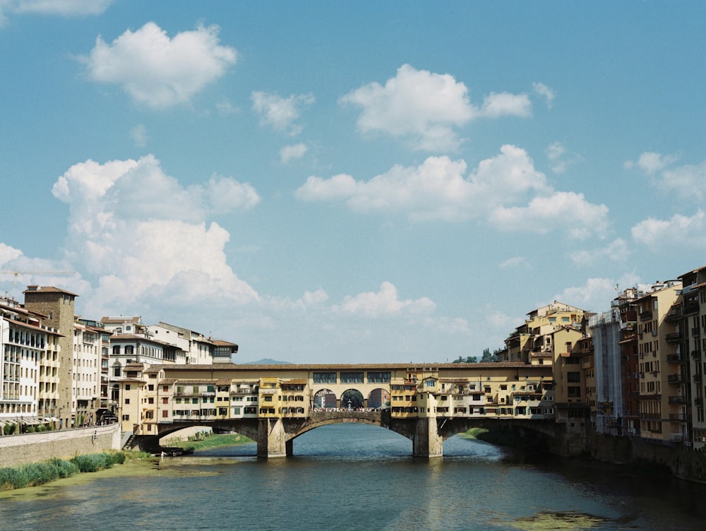 a bridge over a body of water in a city