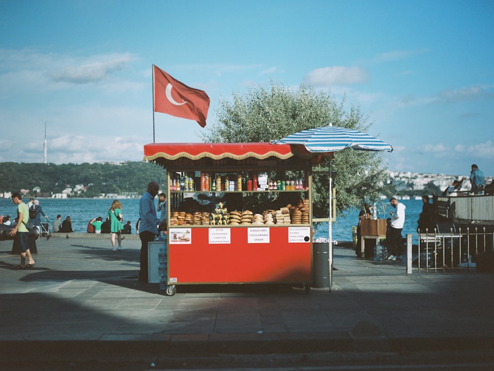 a kiosk with a turkish flag on top of it