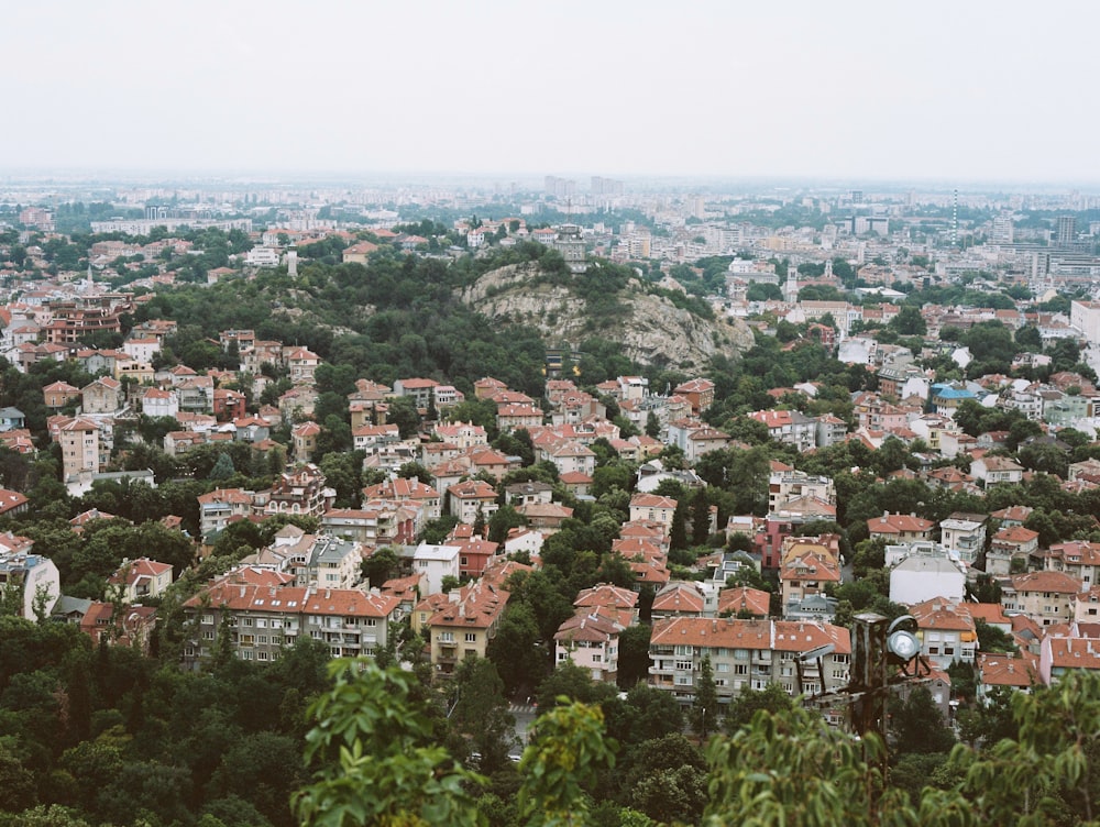 a view of a city from the top of a hill