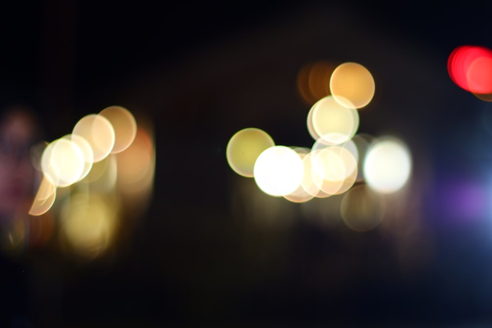 a blurry photo of a city street at night