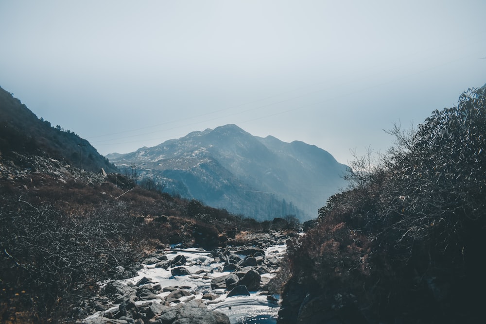 a river running through a rocky mountain side