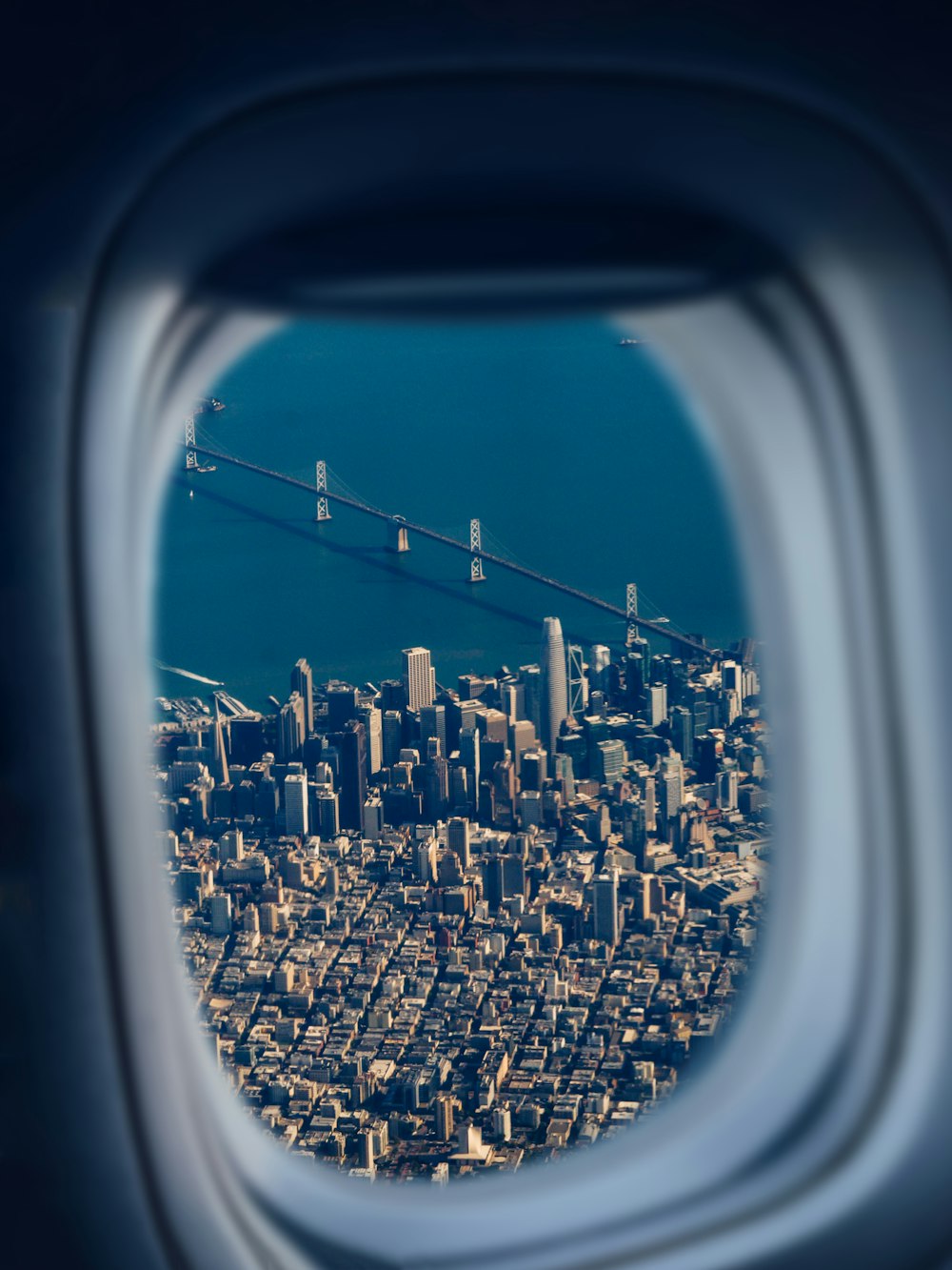 a view of a city from an airplane window